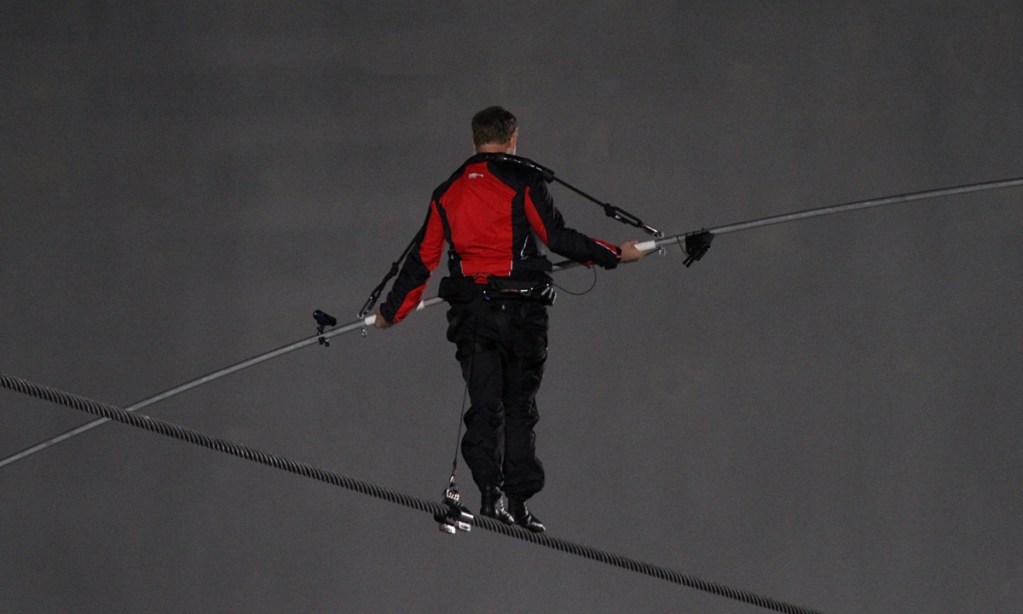 Nik Wallenda walking across a highwire.