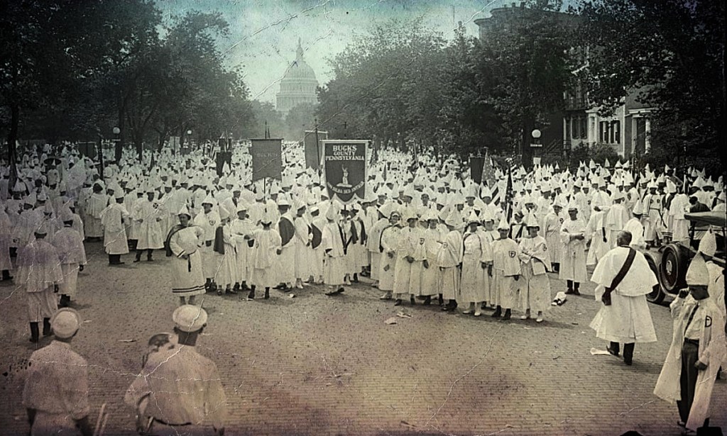 A large crowd of Ku Klux Klan members