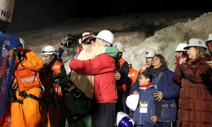 A group of miners are rescued from a collapsing cave
