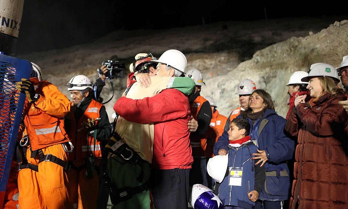 A group of miners are rescued from a collapsing cave