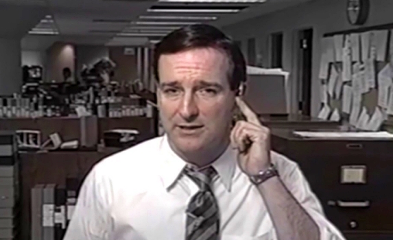 An actor presents a "live" new report