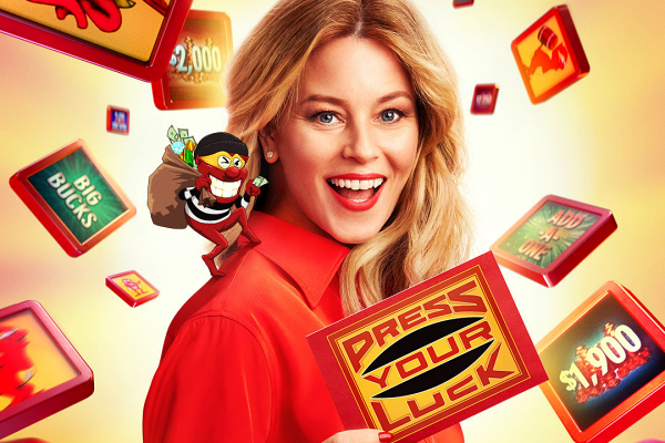 Elizabeth Banks holding a card that says Press Your Luck and a little Whammy character on her shoulder