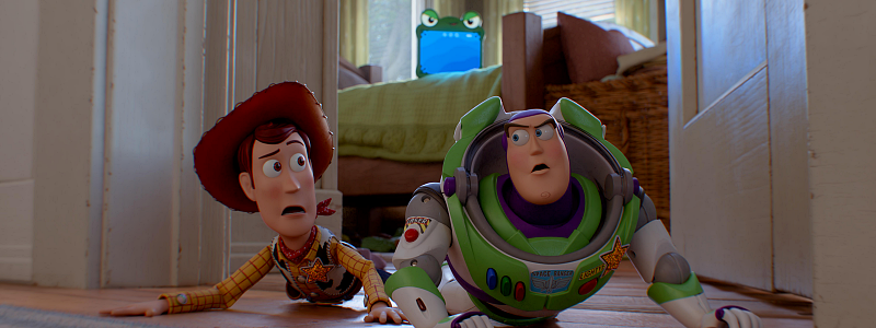 Woody and Buzz Lightyear crawling on the floor