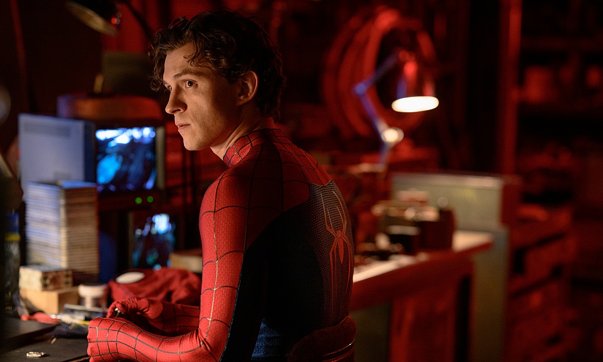 Tom Holland as Spider Man contemplates in front of his computer in Spider-Man Brand New Day